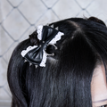 《mine》スパイクピアスレースリボン