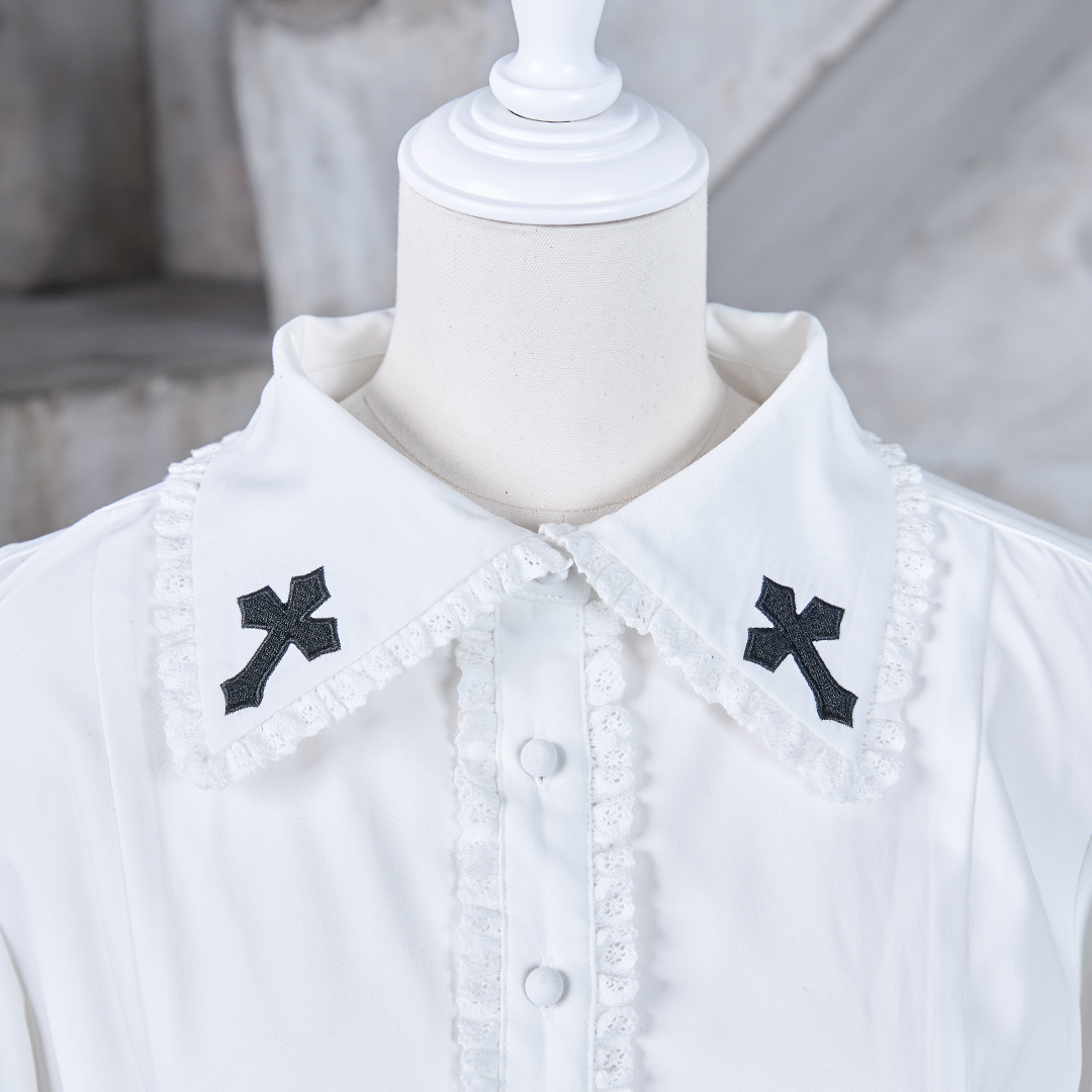 《mine》クロス刺繍ハトメベルトブラウス