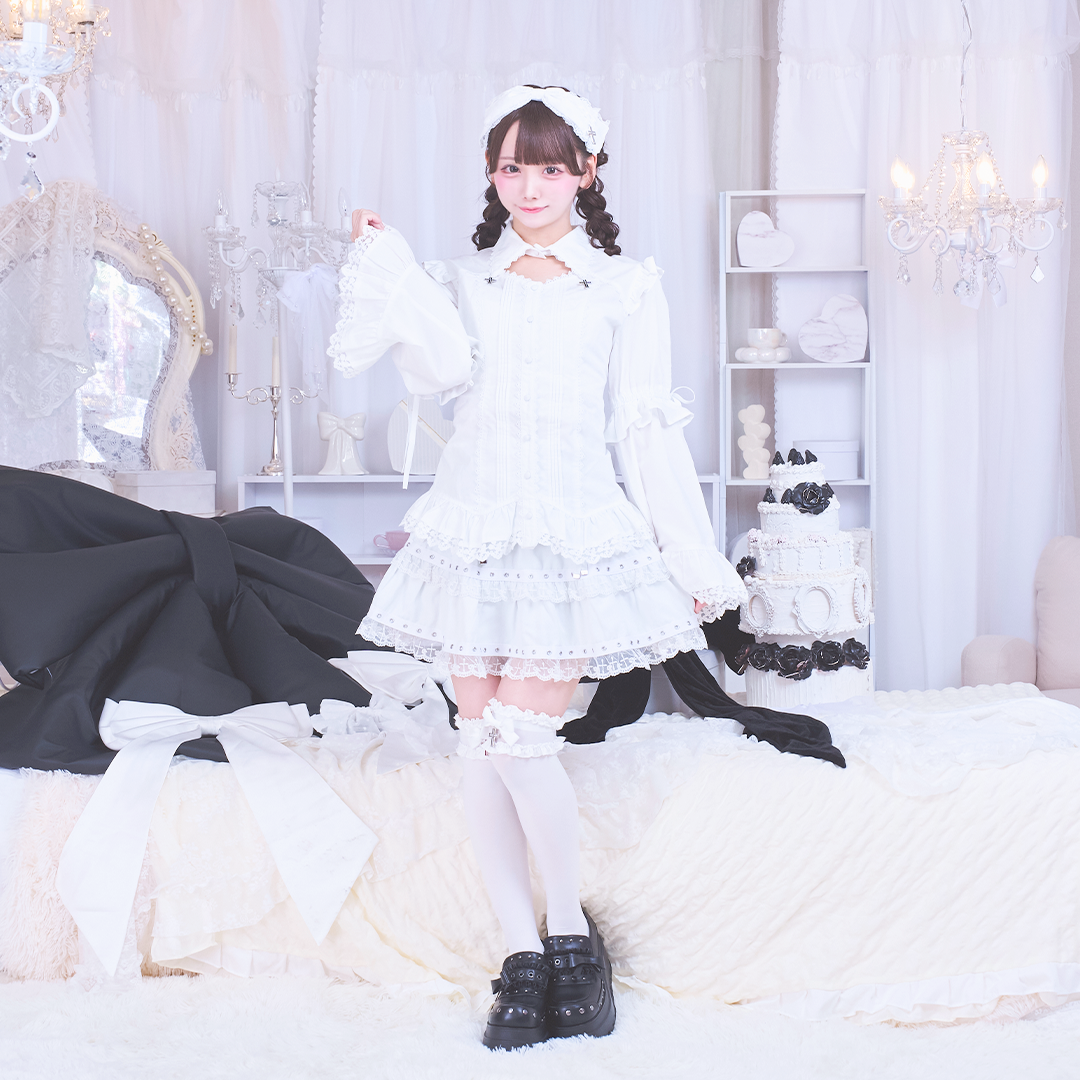 《mine》ロゴクロスベルスリーブブラウス