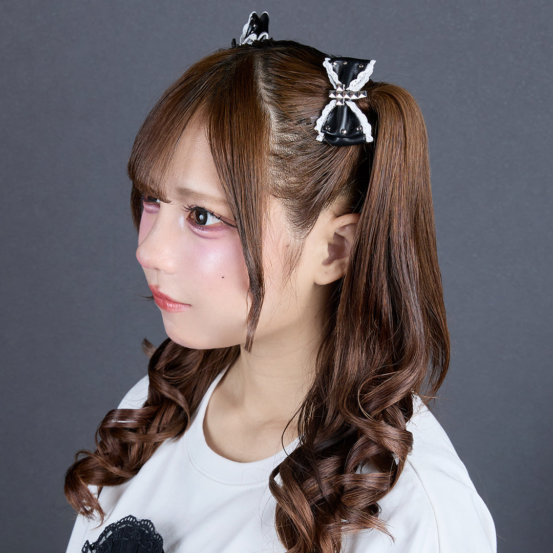 《mine》スタッズクロスレザーフリルリボン