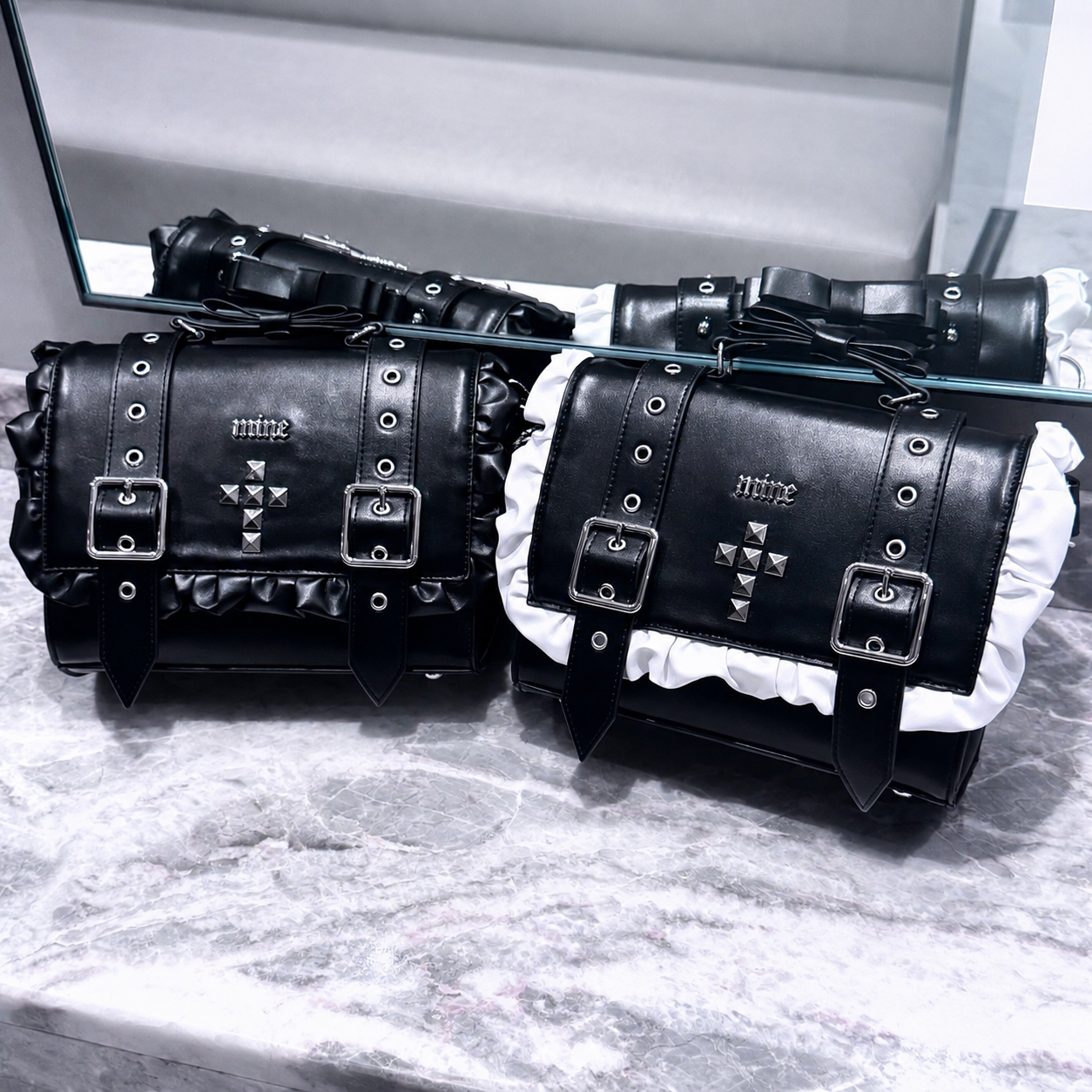 《mine》スタッズクロスフリルバッグ